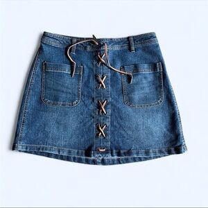 Medium Wash Denim New York And Co skirt with lace-up detail, size US 6